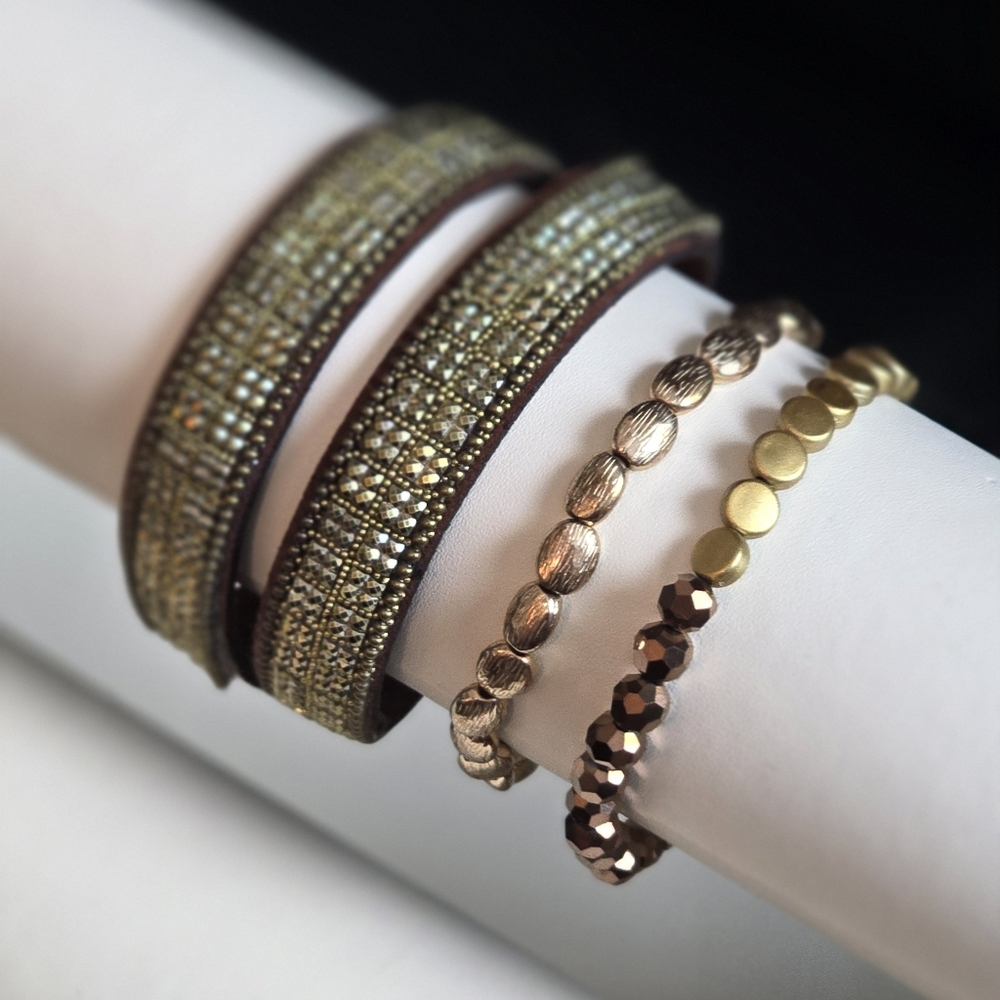 Set of Three Elegant Gold and Brown Bracelets